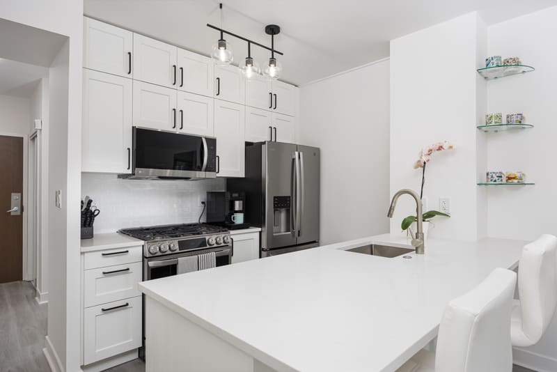 Kitchen with island and stainless appliances