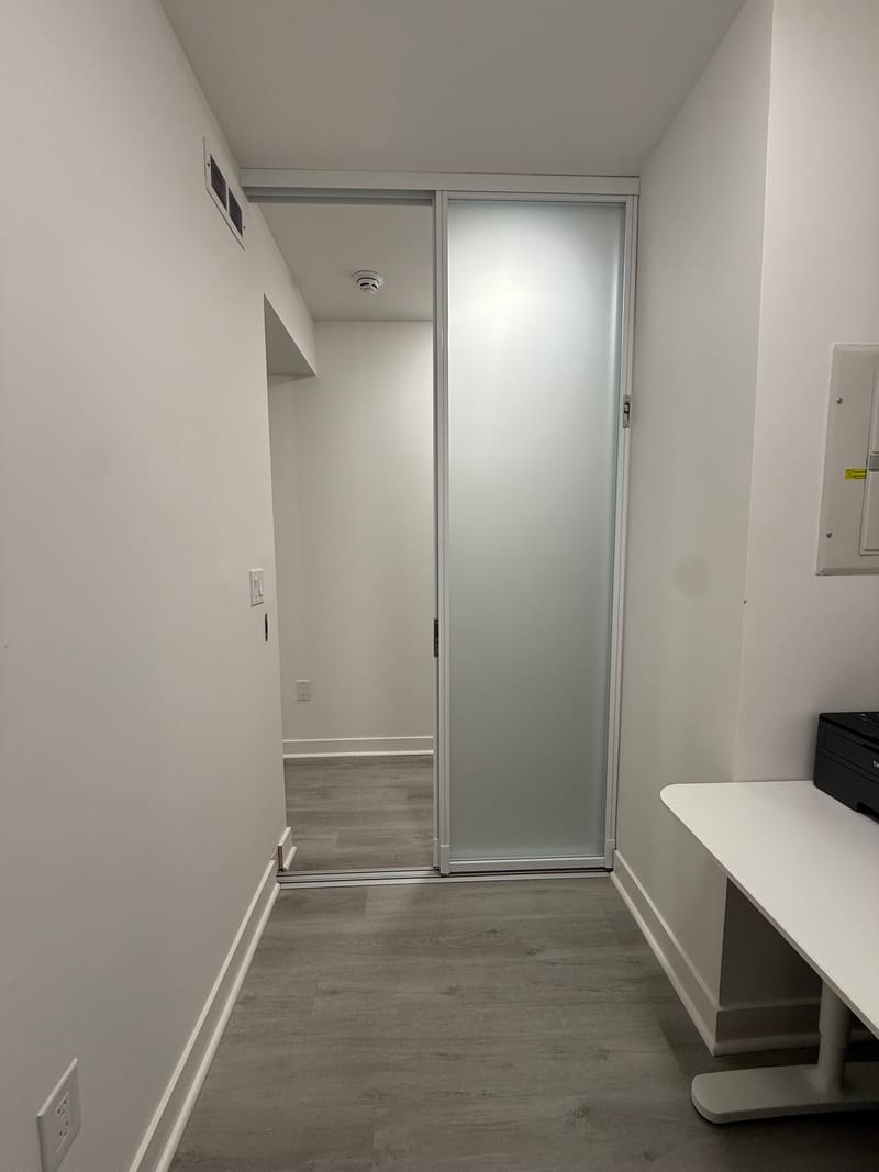 Den with a frosted sliding door