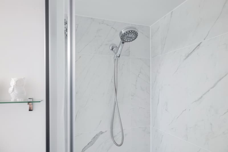 Marble-tiled shower